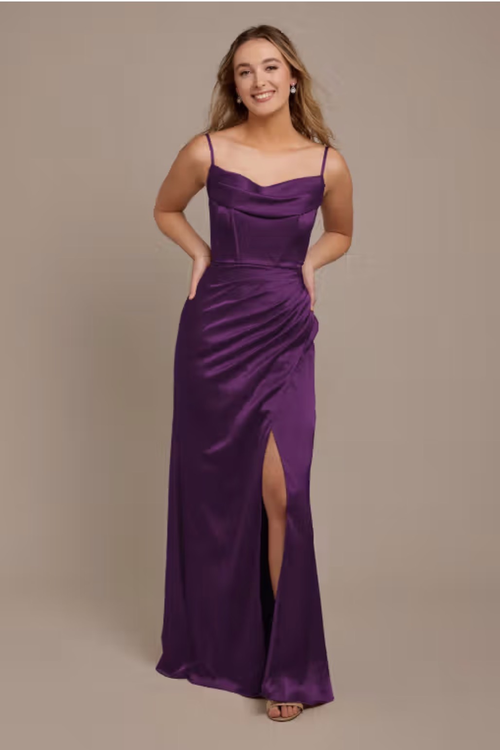 Purple gown with draped bodice.